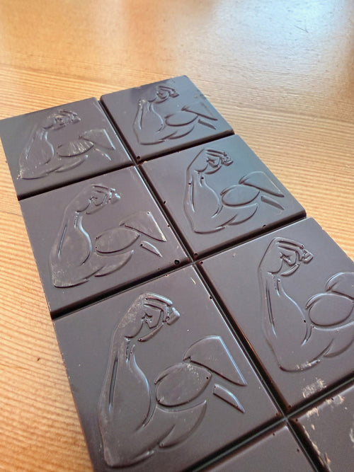 Swole Bar Dark Knight dark chocolate bar with embossed flexed-arm squares